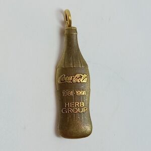 👍 5 for $20 limited edition Coca Cola 1981-1991 Herb Group bronze tone pin